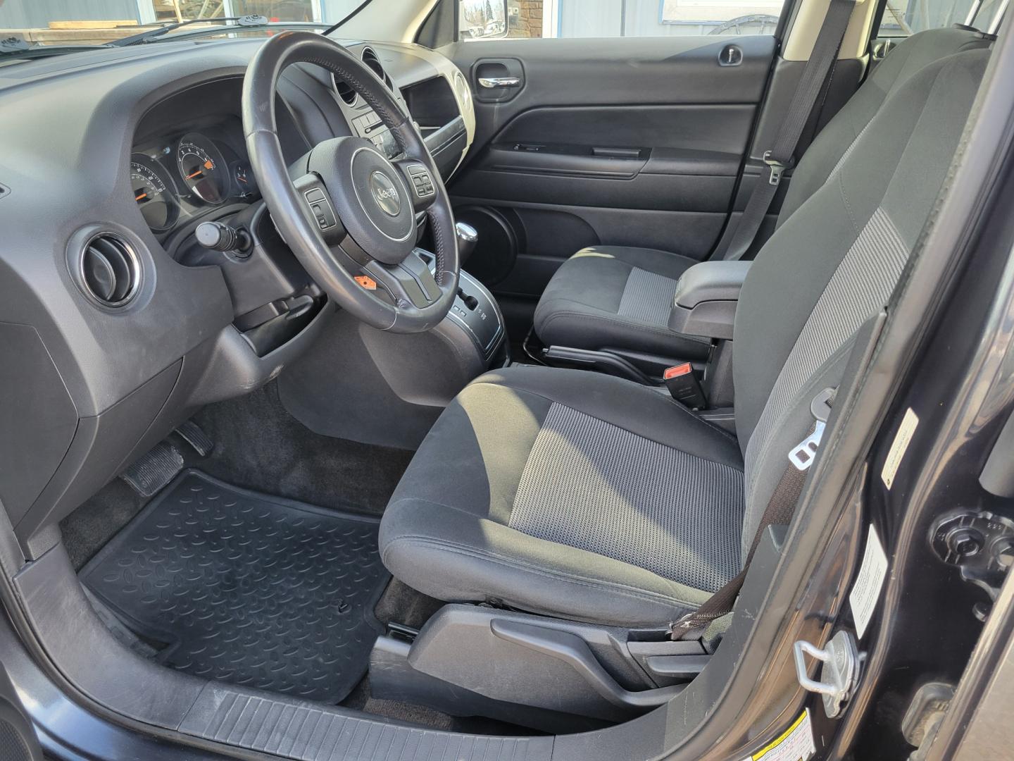 2014 Blue /Black Jeep Patriot Latittude (1C4NJRFB7ED) with an 2.4L I4 engine, 6 Speed Automatic transmission, located at 450 N Russell, Missoula, MT, 59801, (406) 543-6600, 46.874496, -114.017433 - Photo#9